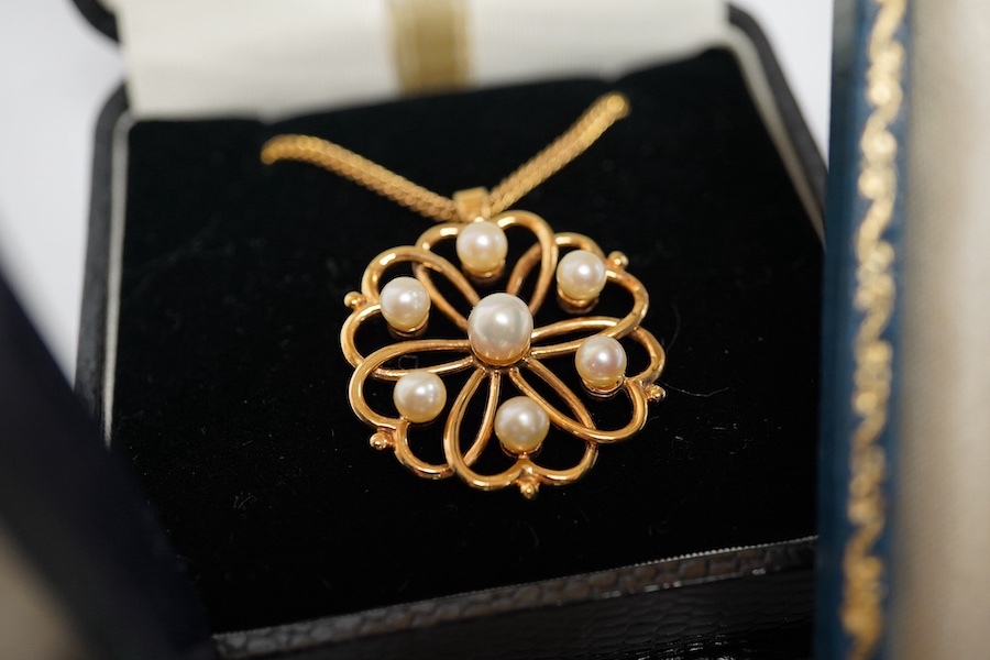 Three pairs of cultured pearl stud earrings, largest 9.3mm diameter, a pair of sleeper earrings, a gold and cultured pearl flower head pendant, stamped 9ct, with a gilt metal chain